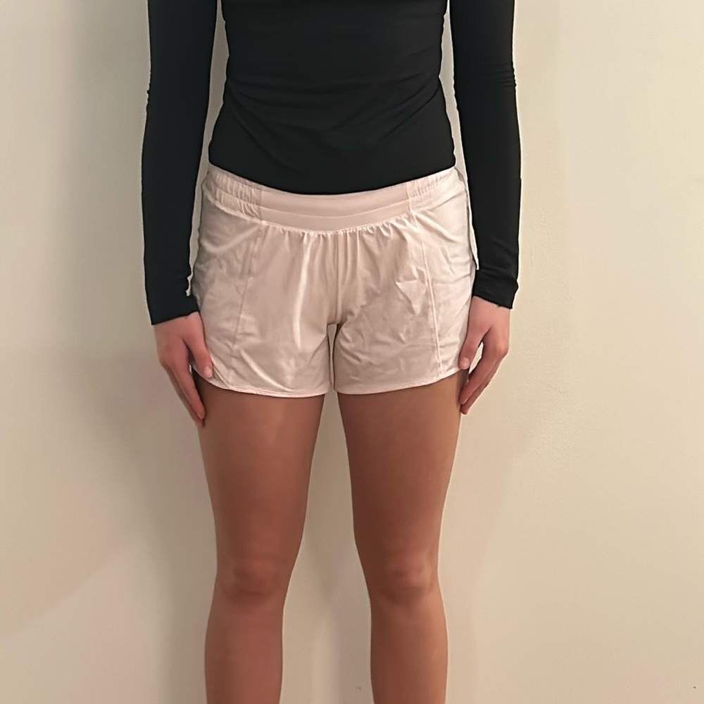 Lululemon size 4, 4 inch inseam. Great condition. Light pink.